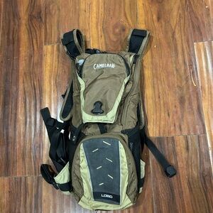 CamelBak Lobo Hicking Backpack, brown/green/black colors